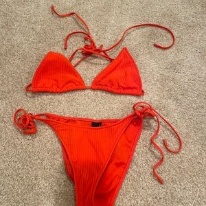 Triangl red swimsuit